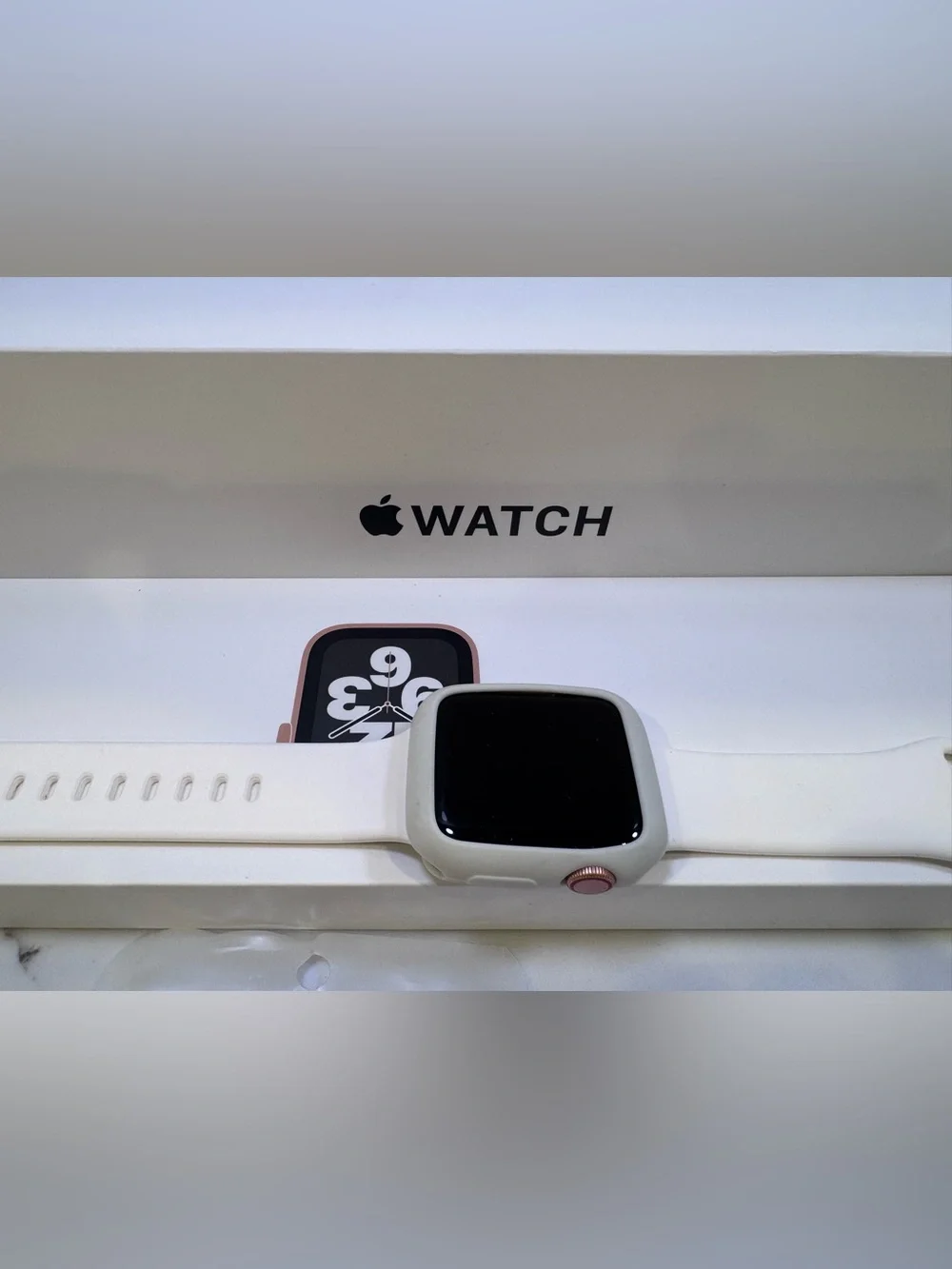 Apple Watch with White Sport Band and Rose Gold Crown